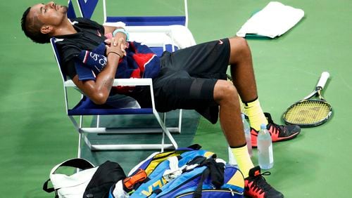 FILE -Nick Kyrgios, of Australia, rests on his chair before the third set against Andy Murray, of Britain, during the first round of the U.S. Open tennis tournament in New York, Sept. 1, 2015. (AP Photo/Julio Cortez, File)