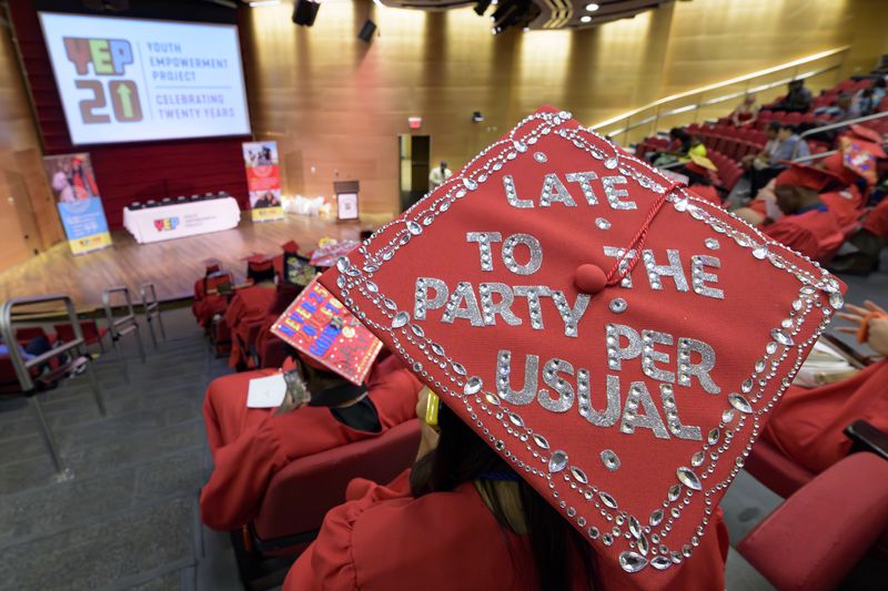 Mariah Middleton decorated her mortarboard graduate cap for a high school equivalency (HiSET) diploma graduation ceremony for the Youth Empowerment Project (YEP) in New Orleans, Thursday, June 27, 2024. (AP Photo/Matthew Hinton)