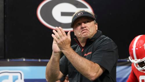 Georgia head coach Kirby Smart walks onto the field before their game against Clemson at Mercedes-Benz Stadium, on Saturday, Aug. 31, 2024, in Atlanta. (Jason Getz / AJC)
