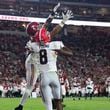 Alabama defensive back Zabien Brown (2) intercepts a pass intended for Georgia wide receiver Colbie Young (8) during the fourth quarter at Bryant-Denny Stadium, Saturday, Sept. 28, 2024, in Tuscaloosa, Al. Alabama won 41-34. (Jason Getz / AJC)