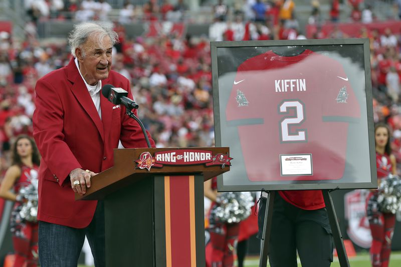 FILE - Former Tampa Bay Buccaneers defensive coordinator Monte Kiffin speaks to the crowd after being inducted into the Buccaneer's Ring of Honor during halftime of an NFL football game against the Atlanta Falcons Sunday, Sept. 19, 2021, in Tampa, Fla. Kiffin, a long-time NFL assistant coach whose Buccaneers defenses routinely ranked among the league’s best, died Thursday, July 11, 2024. He was 84. (AP Photo/Mark LoMoglio, File)