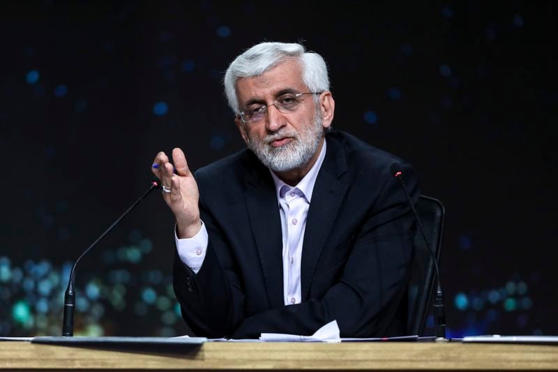 In this picture made available by Iranian state-run TV, IRIB, presidential candidate for June 28 election Saeed Jalili, former Iran's top nuclear negotiator, speaks in a debate of the candidates at the TV studio in Tehran, Iran, Thursday, June 20, 2024. (Morteza Fakhri Nezhad/IRIB via AP)