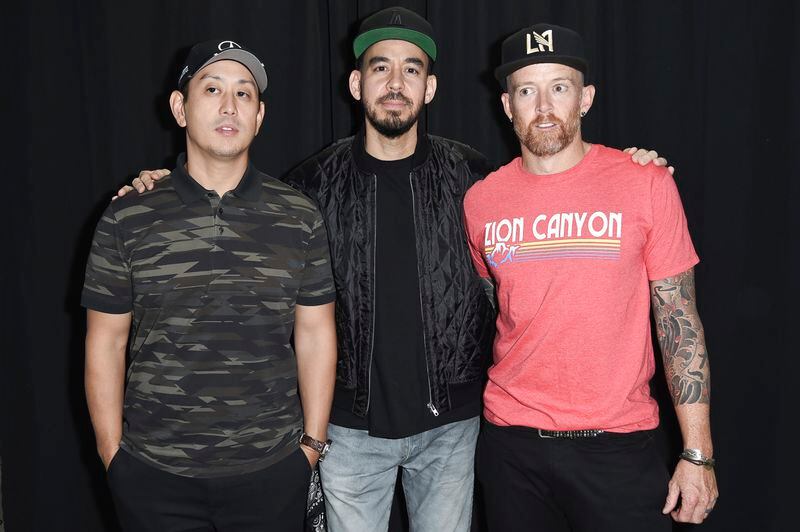 FILE - Joe Hahn, from left, Mike Shinoda and Dave Farrell pose backstage after Linkin Park and Friends Celebrate Life in Honor of Chester Bennington at the Hollywood Bowl on Friday, Oct. 27, 2017, in Los Angeles. (Photo by Richard Shotwell/Invision/AP, File)