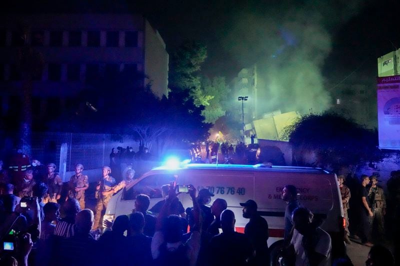 FILE - Ambulances arrive at the site of an Israeli airstrike in Beirut's southern suburbs Friday, Sept. 27, 2024. (AP Photo/Bilal Hussein, File)