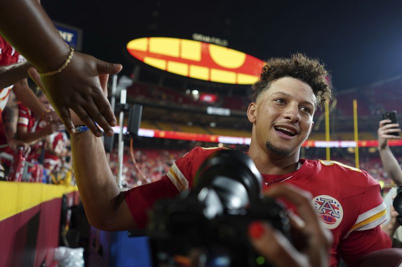 Kansas City Chiefs quarterback Patrick Mahomes celebrates as he heads off the field following an NFL football game against the Baltimore Ravens Thursday, Sept. 5, 2024, in Kansas City, Mo. The Chiefs won 27-20. (AP Photo/Ed Zurga)