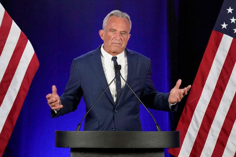 Independent presidential candidate Robert F. Kennedy Jr. announces he is suspending his presidential campaign at a news conference Friday, Aug 23, 2024, in Phoenix. (AP Photo/Darryl Webb)