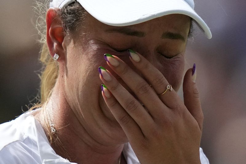 Donna Vekic of Croatia reacts after loosing a point against Jasmine Paolini of Italy during their semifinal match at the Wimbledon tennis championships in London, Thursday, July 11, 2024. (AP Photo/Mosa'ab Elshamy)
