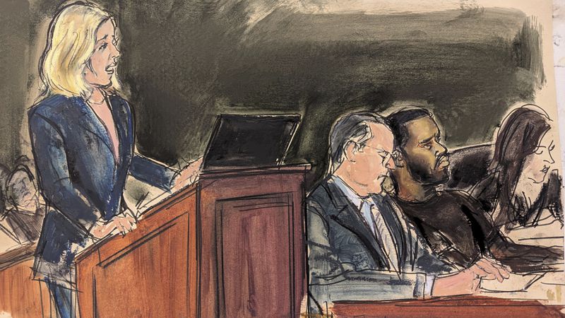 Assistant U.S. Attorney Emily Johnson, left, presents her argument for remand during a bail hearing for Sean "Diddy" Combs, second from right, in federal court, Wednesday, Sept. 18, 2024, in New York. Combs was accompanied by his attorneys Marc Agnifilo, second from left, and Teny Garagos. (Elizabeth Williams via AP)