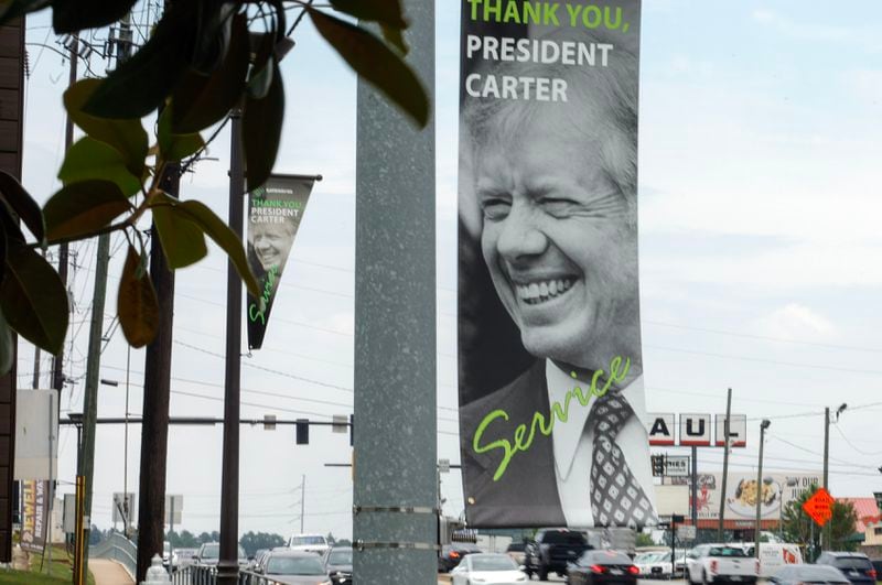 Views of Jimmy Carter banners along Jimmy Carter Boulevard in Norcross shown on Monday, May 22, 2023. (Natrice Miller/ natrice.miller@ajc.com)