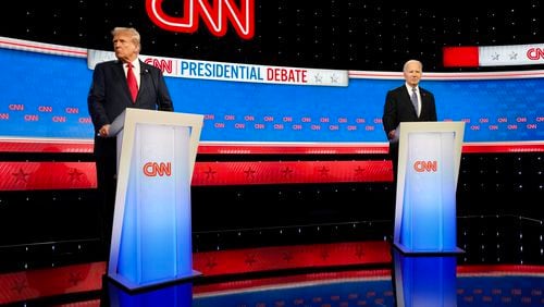 
                        Former President Donald Trump, left, and President Joe Biden during a commercial break in their debate in Atlanta on Thursday night, June 27, 2024. The debate had analysts in Asia fretting. (Ruth Fremson/The New York Times)
                      