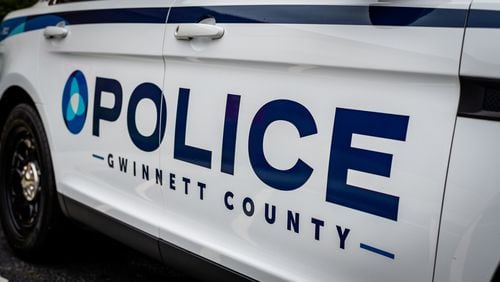 A Gwinnett County police officer was arrested Saturday and is charged with child molestation, police said.