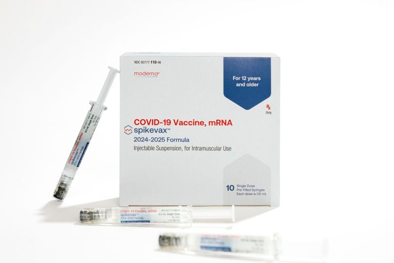 This photo provided by Moderna in August 2024 shows packaging and syringes for the company's updated COVID vaccine for ages 12 and older approved by the U.S. Food and Drug Administration on Thursday, Aug. 22, 2024. (Moderna via AP)