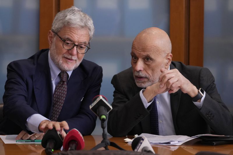 National Anti-Mafia Prosecutor Giovanni Milillo, left is flanked by Milan's Prosecutor Marcello Viola during a news conference at the Milan's court, in Milan, Italy, Monday, Sept. 30, 2024. (AP Photo/Luca Bruno)