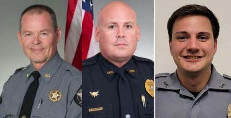 Three law enforcement officers were injured during the pursuit of two men in a 2015 Nissan Sentra who began firing a rifle out of their car. Carrollton police Sgt. Rob Holloway (center) was injured during the pursuit and crashed his patrol car. Carroll County sheriff's Deputy Jay Repetto (left) and Villa Rica police Officer Chase Gordy were each shot during a gun battle after the suspects crashed their car.