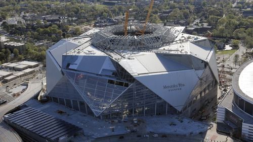 Construction continues on Mercedes-Benz Stadium in downtown Atlanta. Aerial photo shot on March 31. BOB ANDRES /BANDRES@AJC.COM