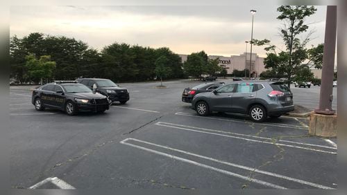 A child was taken to the hospital after they were left inside a car at a Cobb County mall. (Credit: Channel 2 Action News)