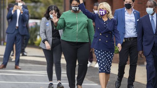 10/12/2020 - Decatur, Georgia - Dr. Jill Biden and former gubernatorial candidate Stacey Abrams wave to a crowd gathered at a rally for Presidential Democratic nominee Joe Biden and Vice President nominee Kamala Harris in downtown Decatur, Monday, October 12, 2020.  (Alyssa Pointer / Alyssa.Pointer@ajc.com)