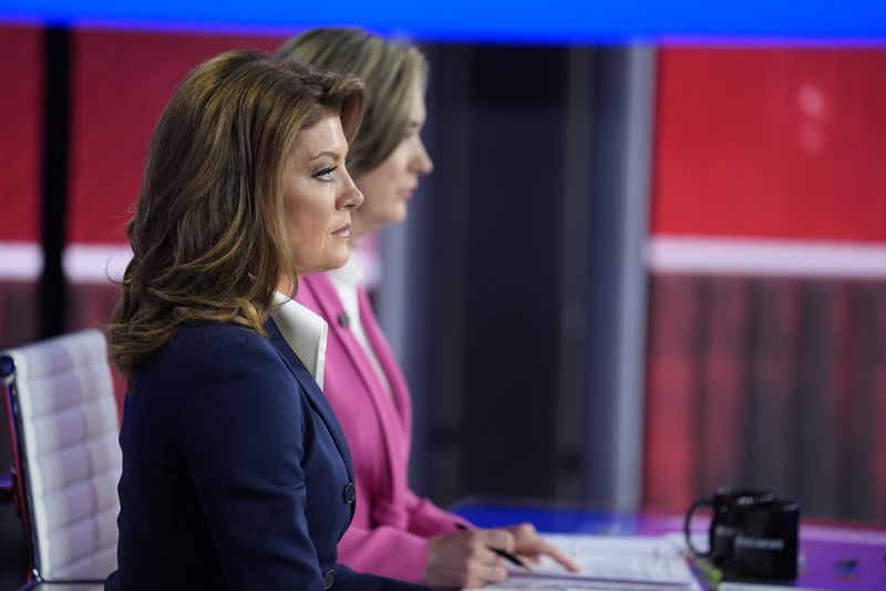 Moderators Norah O'Donnell and Margaret Brennan listen as Republican vice presidential nominee Sen. JD Vance, R-Ohio, speaks during a vice presidential debate hosted by CBS News, with Democratic vice presidential candidate Minnesota Gov. Tim Walz, Tuesday, Oct. 1, 2024, in New York. (AP Photo/Matt Rourke)