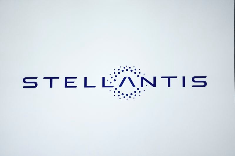 FILE - A Stellantis logo is shown at the North American International Auto Show, Sept. 13, 2023, in Detroit. (AP Photo/Paul Sancya, File)