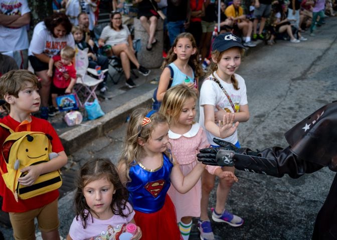 Thousands lined up along Peachtree Street Saturday morning for the annual Dragon Con parade.