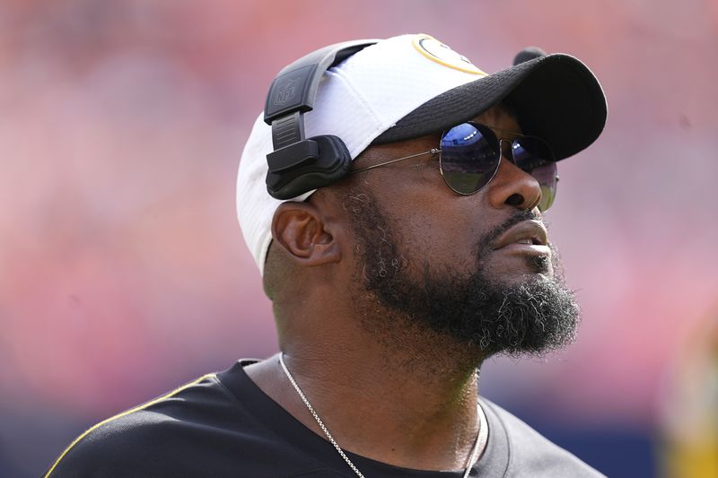 Pittsburgh Steelers head coach Mike Tomlin watches during the second half of an NFL football game against the Denver Broncos, Sunday, Sept. 15, 2024, in Denver. (AP Photo/David Zalubowski)