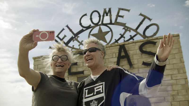 This image released by Netflix shows Harper Steele, left, and Will Ferrell in a scene from "Will & Harper." (Netflix via AP)