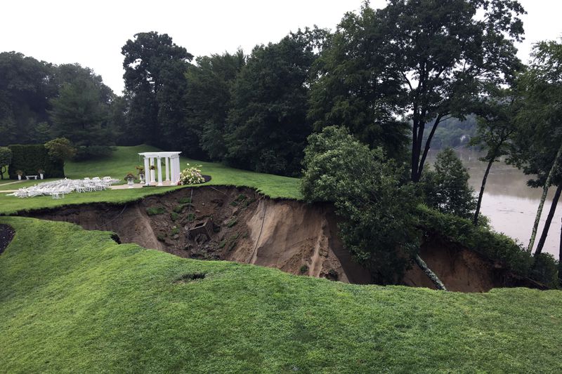 Storm damage on the grounds of The Waterview reception hall in Monroe, Conn., is shown Monday, Aug. 19, 2024. (Arnold Gold/Hearst Connecticut Media via AP)