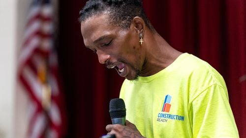 Raynard LaNier Jr., a graduate of the Construction Ready training program, speaks during his graduation ceremony at the East Point City Hall Annex in East Point, GA on Friday, August 2, 2024. (Seeger Gray / AJC)