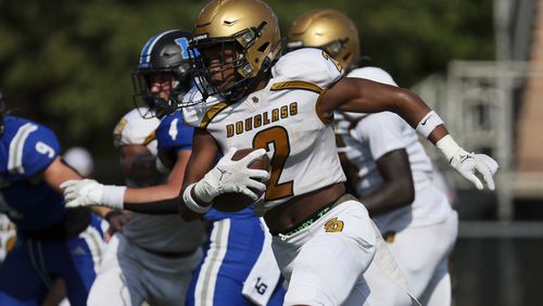 Douglass wide receiver Casey Barner (2) runs for yards during the first half against LaGrange of the Corky Kell Dave Hunter Classic at Kell High School, Wednesday, August 14, 2024, in Marietta, Ga. (Jason Getz / AJC)
