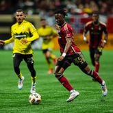 Atlanta United defender Ajani Fortune #35 dribbles during the first half of the match against the Columbus Crew at Mercedes-Benz Stadium in Atlanta, GA on Saturday July 20, 2024. (Photo by  Madelaina Polk/Atlanta United)