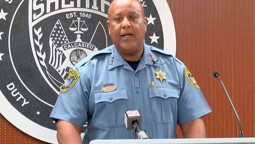 This image made from video provided by KPLC shows Calcasieu Parish Sheriff Gary “Stitch” Guillory speaking at a press conference Tuesday, July 9, 2024. Guillory said a 1-year-old “miracle baby” survived two days of sometimes stormy weather before a truck driver spotted him crawling along a roadside the day after his 4-year-old brother was found dead and his mother was arrested in Mississippi. (KPLC via AP)