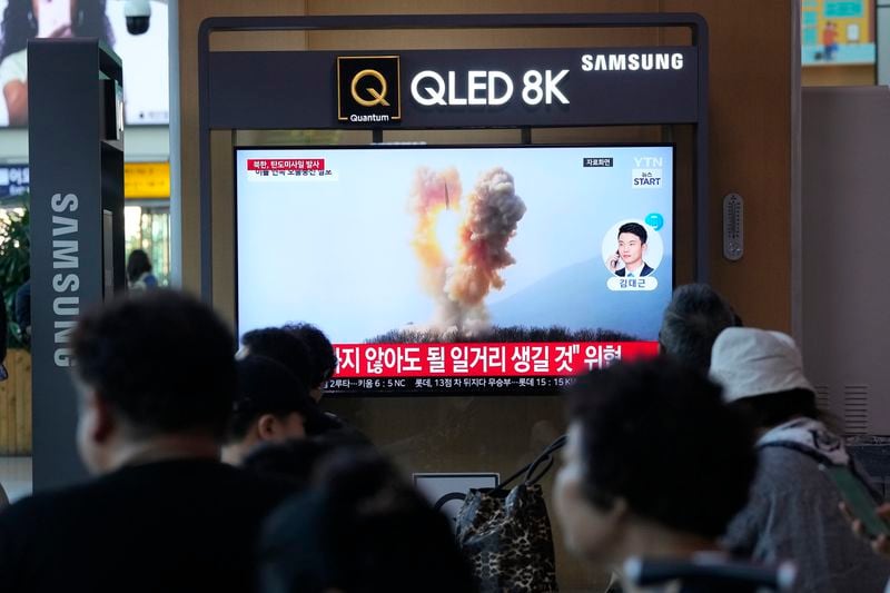 A file image of a missile launch by North Korea is shown during a news program, at Seoul Railway Station in Seoul, South Korea, Wednesday, June 26, 2024. North Korea fired a ballistic missile toward its eastern waters on Wednesday, South Korea's military said, in an apparent protest of the recent regional deployment of a U.S. aircraft carrier for a new trilateral military drill with South Korea and Japan. (AP Photo/Ahn Young-joon)