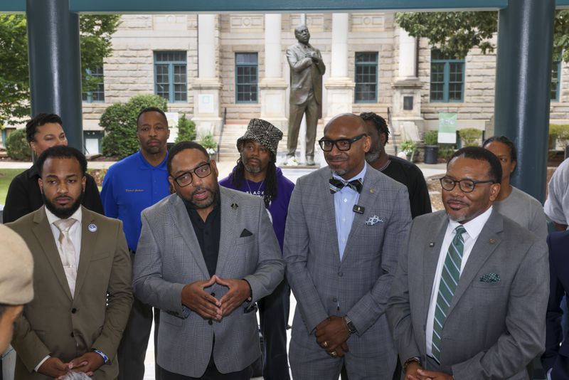 Members of the Black Man Lab held a news conference in Decatur Square on Thursday.