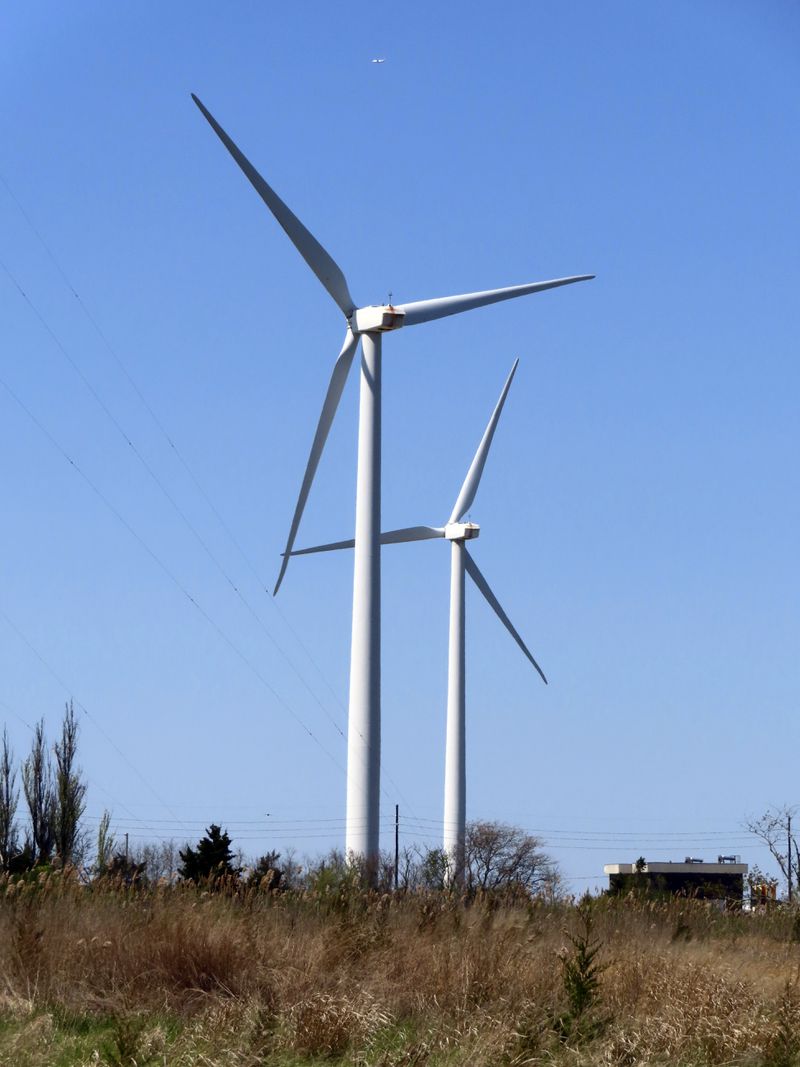 Land-based wind turbines spin in Atlantic City, N.J., April 28, 2022. (AP Photo/Wayne Parry)