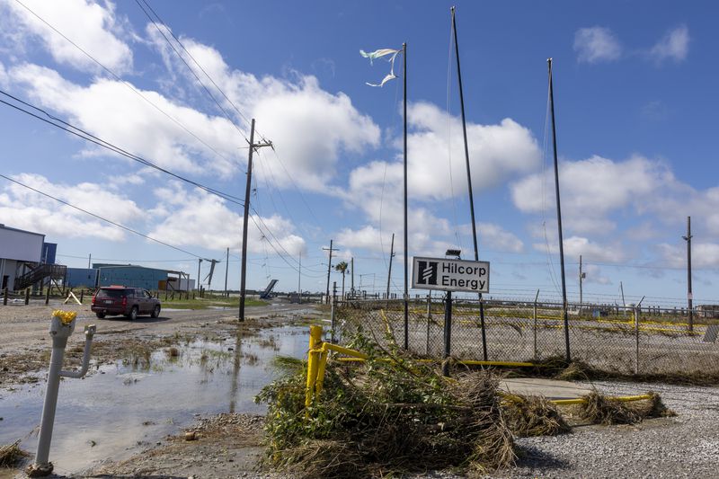 Little Caillou Fire Department staff take initial surveys of the damage from Hurricane Francine at the end of Highway 57 in the southern most point of Terrebonne Parish, La., Thursday, Sept. 12, 2024. (Chris Granger/The Times-Picayune/The New Orleans Advocate via AP)