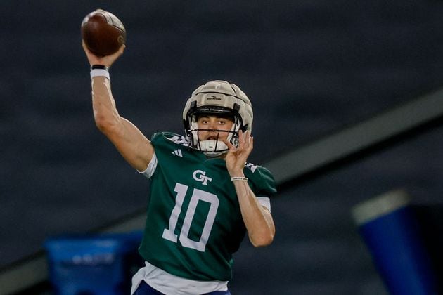 Georgia Tech quarterback Haynes King (10) attempts a pass to a wide receiver during the second day of football practice at the Brock Indoor Practice Facility on Thursday, July 25, 2024, in Atlanta. (Miguel Martinez / AJC)