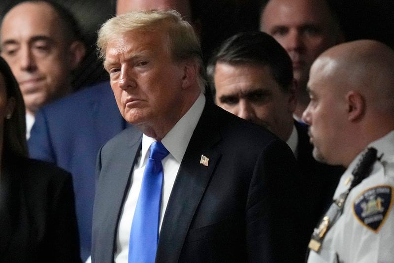 FILE - Former President Donald Trump walks out of the courtroom to make comments to members of the media after a jury convicted him of felony crimes for falsifying business records in a scheme to illegally influence the 2016 election, at Manhattan Criminal Court, May 30, 2024, in New York. Trump is scheduled to be interviewed by New York probation officials. The interview Monday, June 10, is a required step before his July sentencing. Three people familiar with the plan say Trump will do the interview via a computer video conference from his Florida home. (AP Photo/Seth Wenig, Pool, File)