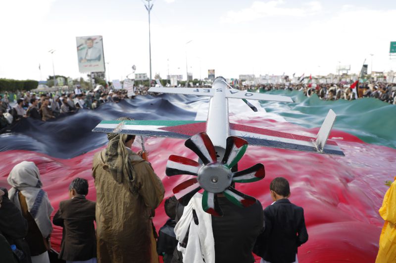 Houthi supporters attend an anti-Israel and anti-US rally in Sanaa, Yemen, Friday, Aug. 23, 2024. (AP Photo/Osamah Abdulrahman)