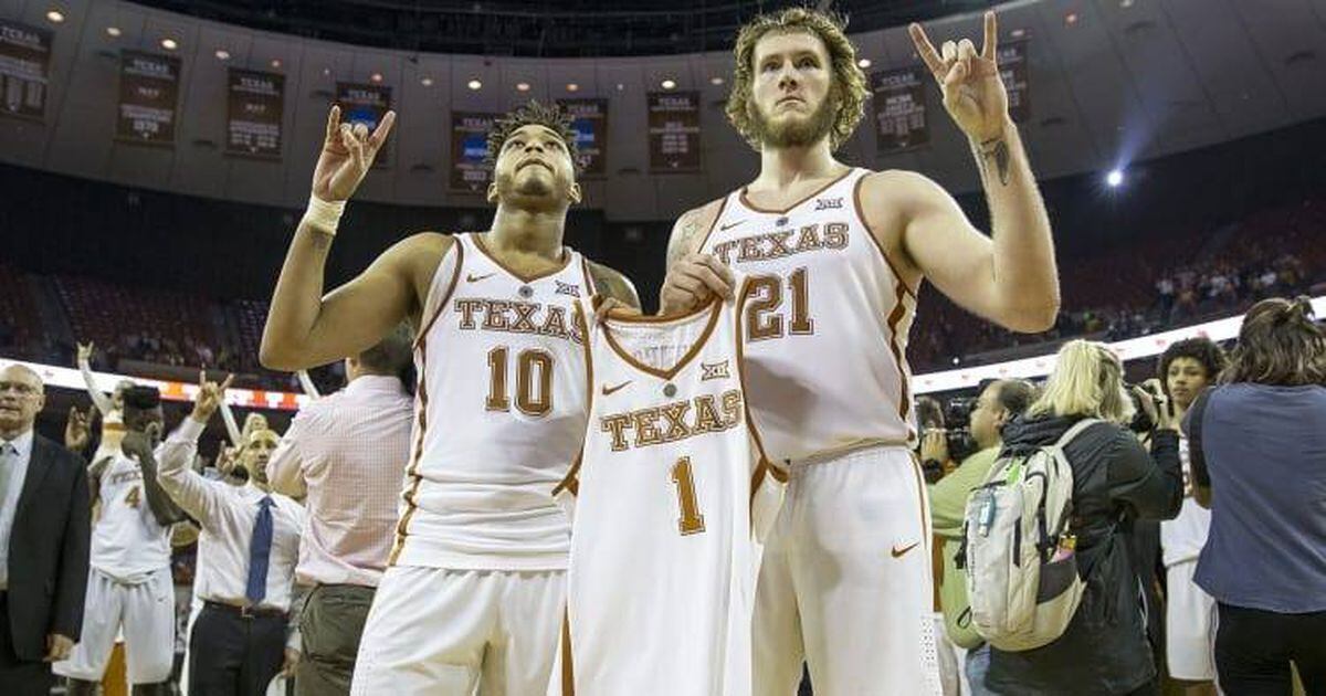 Texas players hold up jersey of Andrew Jones, who is battling leukemia,  after beating No. 16 TCU in 2OT – New York Daily News