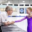 International Olympic Committee President Thomas Bach shakes hands with figure skater Annabelle Atkinson, 10, of Salt Lake City, as they talk at the Utah Olympic Oval in Kearns, Utah, Saturday, Sept. 28. 2024. (Isaac Hale/The Deseret News via AP)