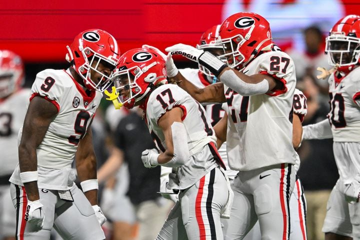 Georgia Bulldogs wide receiver Anthony Evans III (17) reacts with teammates during the second half of the SEC Championship football game against the Alabama Crimson Tide at the Mercedes-Benz Stadium in Atlanta, on Saturday, December 2, 2023. (Hyosub Shin / Hyosub.Shin@ajc.com)