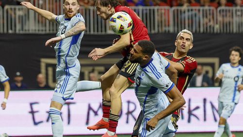 Atlanta United midfielder Saba Lobzhanidze (9) cannot connect with a header during the first half of an MLS soccer match against CF Montreal on Wednesday, Oct. 2, 2024, in Atlanta. (Miguel Martinez/Atlanta Journal-Constitution via AP)