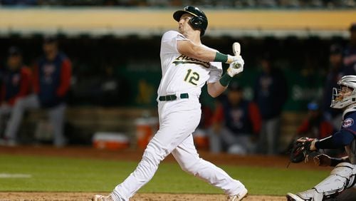 Sean Murphy of the Oakland Athletics hits a two-run single in the bottom of the seventh inning against the Minnesota Twins at RingCentral Coliseum on May 17, 2022, in Oakland, California. (Lachlan Cunningham/Getty Images/TNS)