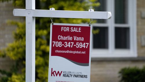 FILE - A for sale sign is displayed in front of a home in Wheeling, Ill., on May 2, 2024. (AP Photo/Nam Y. Huh, File)