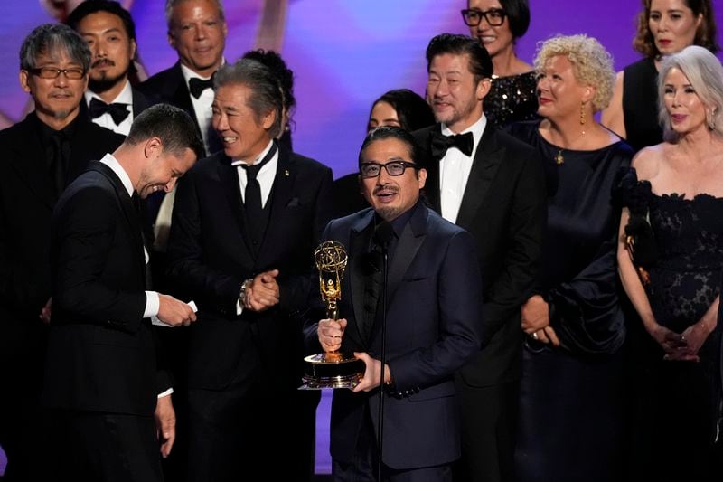 Hiroyuki Sanada, center, and the team from "Shogun" accepts the award for outstanding drama series during the 76th Primetime Emmy Awards on Sunday, Sept. 15, 2024, at the Peacock Theater in Los Angeles. (AP Photo/Chris Pizzello)