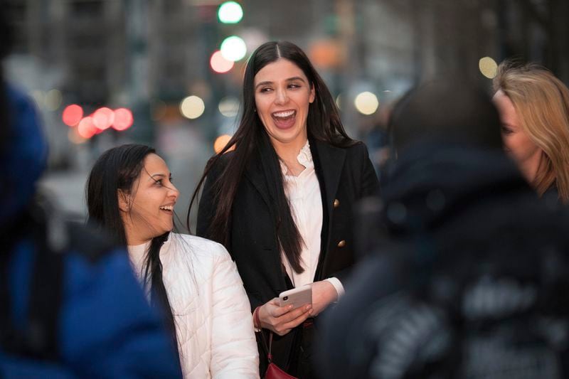 FILE - Emma Coronel, center, and lawyer Mariel Colón leave a federal court, in New York, Jan. 17, 2019, after attending the trial of Coronel's husband Joaquin "El Chapo" Guzman. (AP Photo/Kevin Hagen, File)