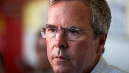 Republican presidential candidate, former Florida Gov. Jeb Bush talks to reporters at The Varsity restaurant during a campaign stop Tuesday, Aug. 18, 2015, in Atlanta. (AP Photo/David Goldman)