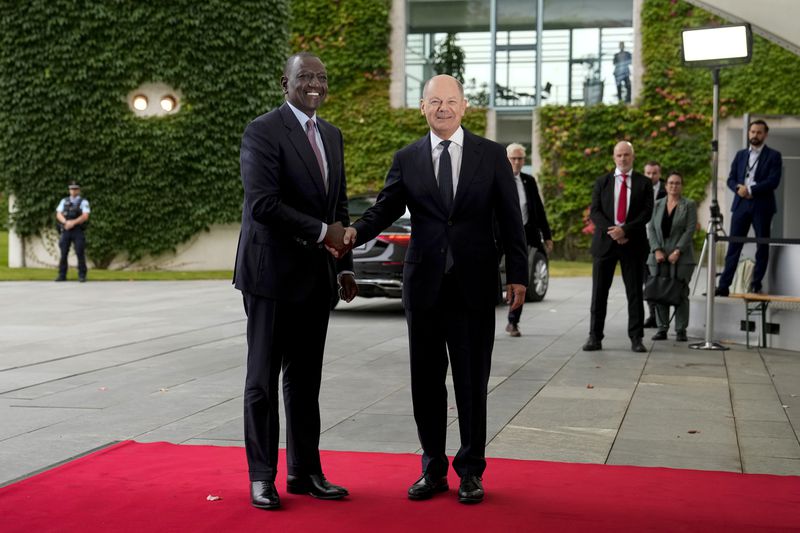 German Chancellor Olaf Scholz, right, welcomes Kenya's President William Ruto at the chancellery in Berlin, Friday, Sept. 13, 2024. (AP Photo/Ebrahim Noroozi)