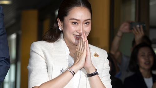 Leader of the Pheu Thai party, Paetongtarn Shinawatra arrives at the party's headquarters in Bangkok, Thailand, Friday, Aug. 16, 2024. (AP Photo/Wason Wanichakorn)