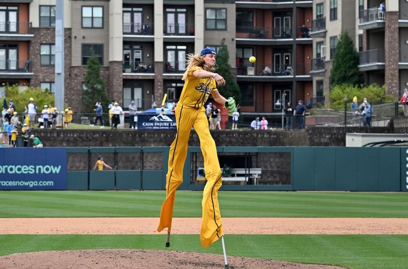 Savannah Bananas' Dakota Albritton throws a pitch during first of three-game series at Coolray Field, Saturday, March 23, 2024, in Lawrenceville. (Hyosub Shin / Hyosub.Shin@ajc.com)